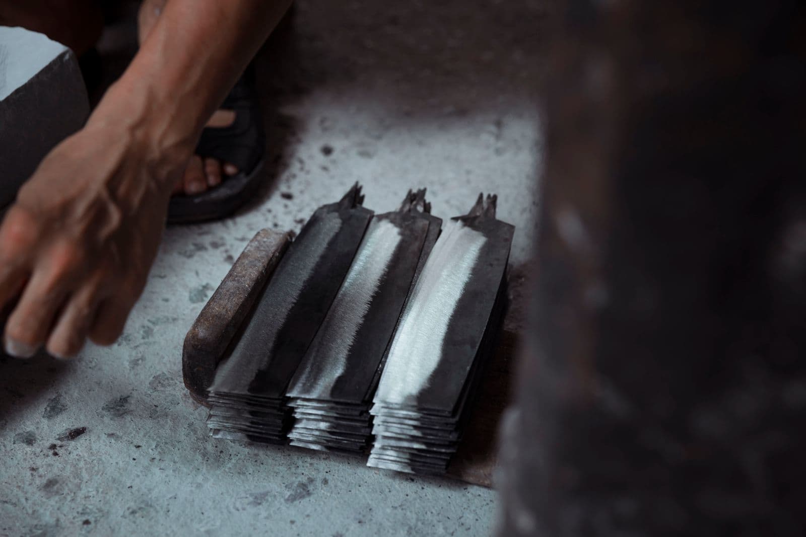 Raw forged steel blade blanks in the workshop