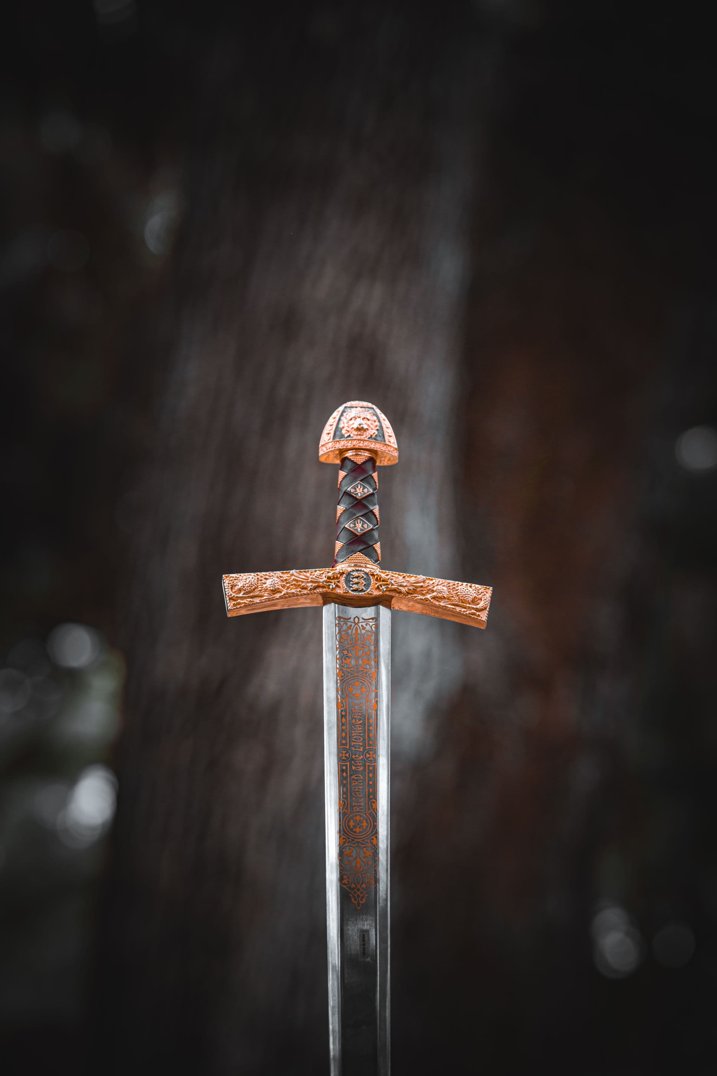 Ornate engraved sword hilt detail