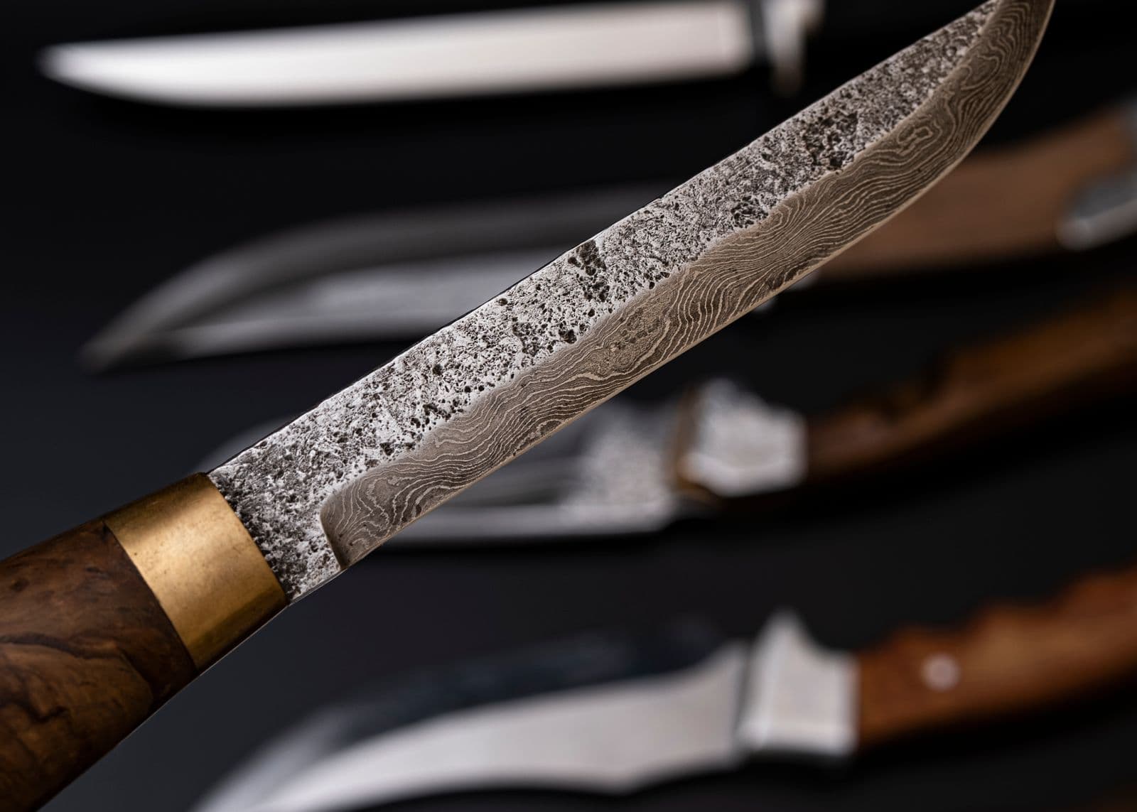 Brass bolster and handle detail on a hand-forged blade