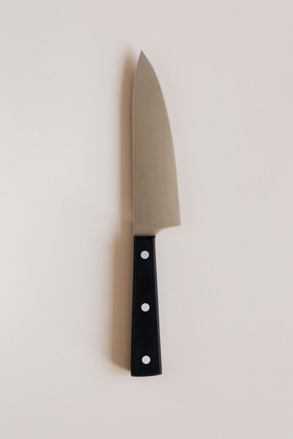Kitchen knife product photo on a light background